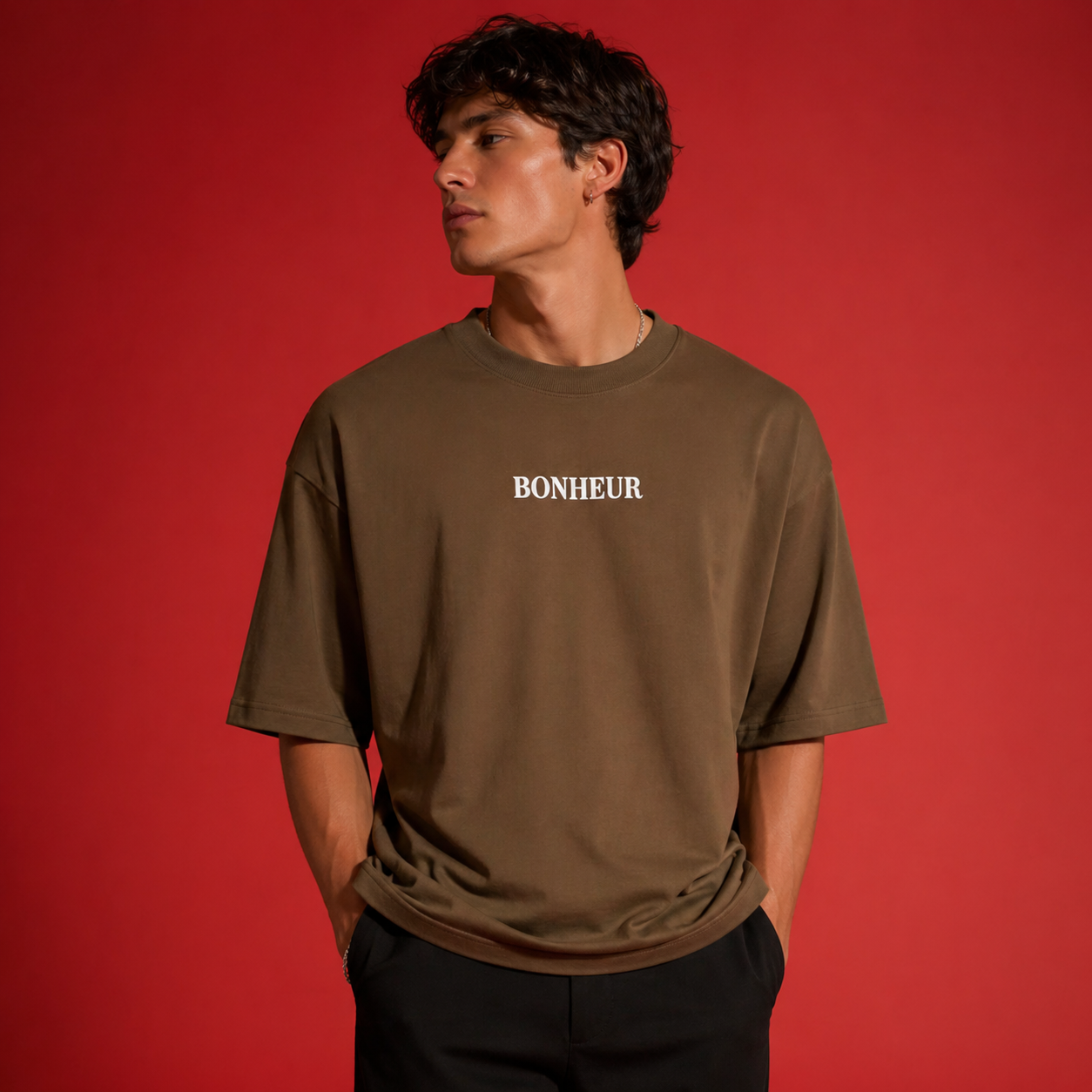 Unisex oversized T-shirt by Bonheur, 240GSM, in soft fabric, shown laid flat with a relaxed fit and classic crew neckline.
