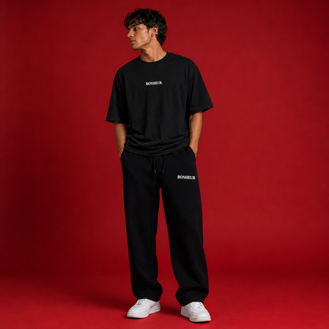 Black BONHEUR 400GSM sweatpants with elastic waistband and cuffs, soft and comfortable for casual wear.